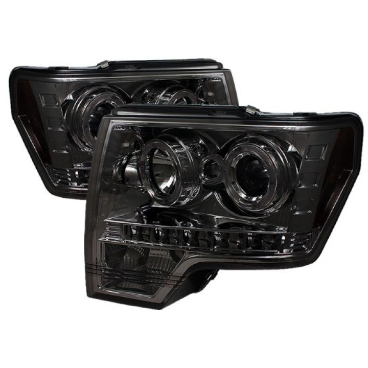 Ford F150 09-14 Projector Headlights LED Halo - LED ( Replaceable LEDs ) - Smoke Spyder Auto in the group Select car model / Ford / F-150 09-14 / Styling at DDESIGN Scandinavia AB (PRO-YD-FF15009-HL-SM)