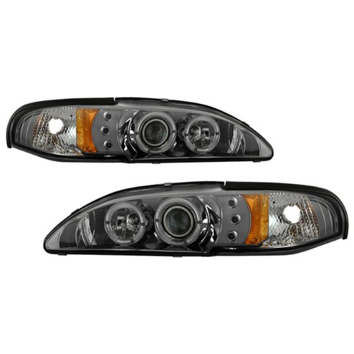 Ford Mustang 94-98 1PC Projector Headlights - LED Halo Smoke - High 9005 (Included) - Low H3 (Included) Spyder Auto in the group Select car model / Ford / Mustang 94-04 / Styling at DDESIGN Scandinavia AB (PRO-YD-FM94-1PC-AM-SMC)