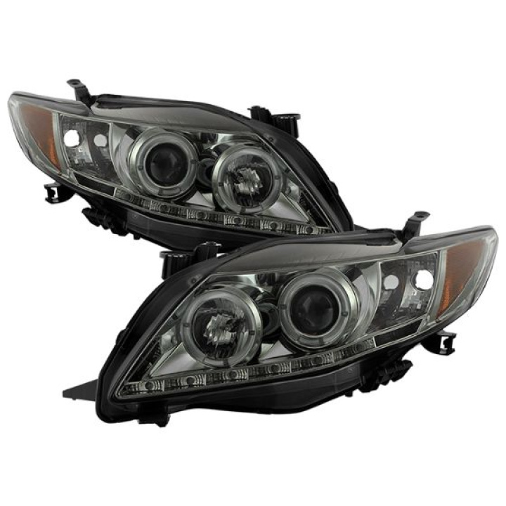 Toyota Corolla 09-10 Projector Headlights - LED Halo - DRL - Smoke Spyder Auto in the group Select car model / Toyota / Corolla / Styling at DDESIGN Scandinavia AB (PRO-YD-TC09-DRL-SM)