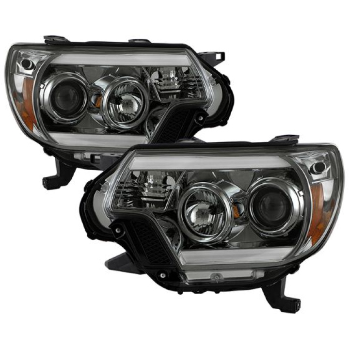 Toyota Tacoma 12-16 Projector Headlights - Light Bar DRL - Smoke Spyder Auto in the group Select car model / Toyota / Tacoma / Styling at DDESIGN Scandinavia AB (PRO-YD-TT12-LBDRL-SM)