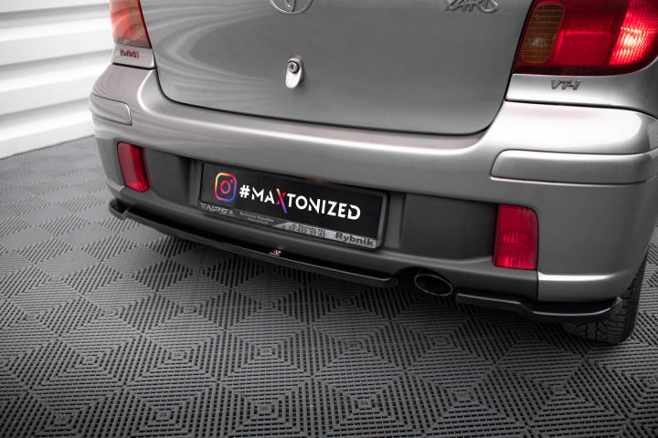 Central Rear Splitter Toyota Yaris T-Sport Mk1 Facelift 2003-2006 Maxton Design in the group Select car model / Toyota / Yaris / Styling / Rear spoiler at DDESIGN Scandinavia AB (TO-YA-1F-TS-RSD1G)