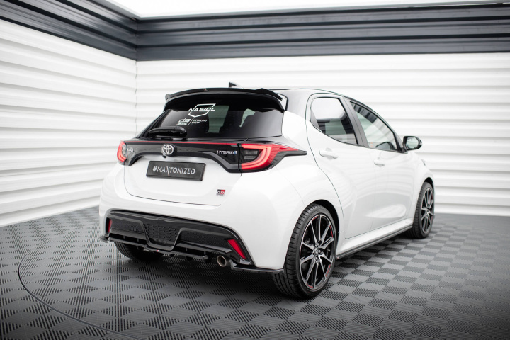 Central Rear Splitter (with vertical bars) Toyota Yaris GR Sport Mk4 Maxton Design in the group Select car model / Toyota / Yaris / Styling / Rear spoiler at DDESIGN Scandinavia AB (TOYA4GRSPORTRSD1GRD1G)